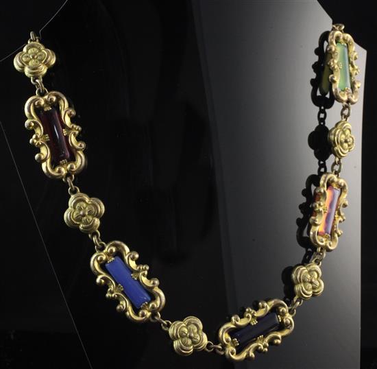 A Victorian style gilt metal and coloured paste necklace, 16.5in.